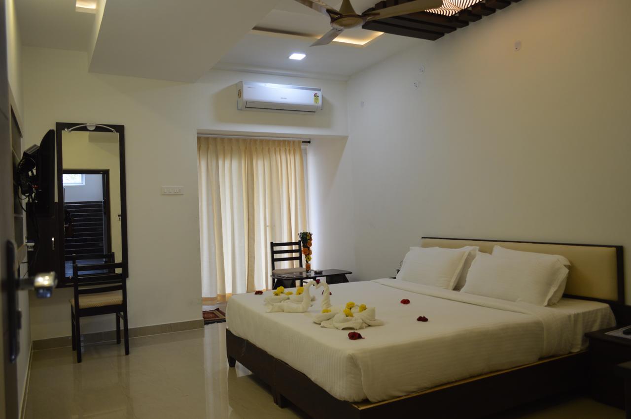 Hotel Ambai Grand Ambāsamudram Екстериор снимка
